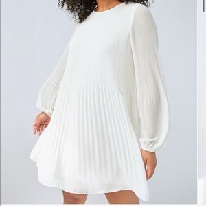 Day Dreamer Mini Dress. Color Mauve Print. Size Medium